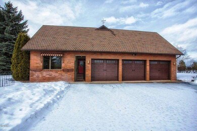Attached triple garage