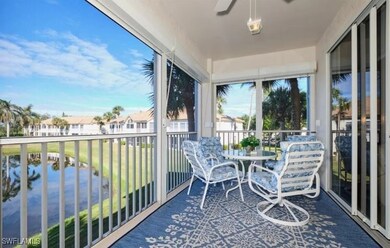 Sunroom with a water view