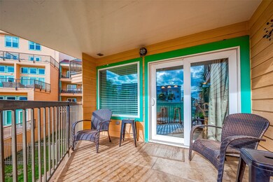 With a secure fence and charming buildings nearby,