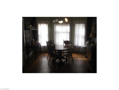 Dining Room view from kitchen. Hard wood floors.