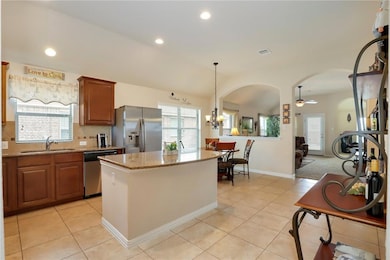 Kitchen with appliances with stainless steel fini