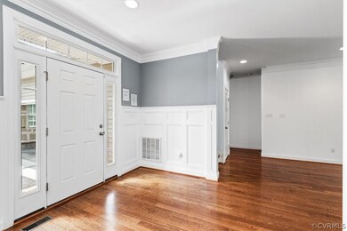 Beautiful foyer with hardwood floors