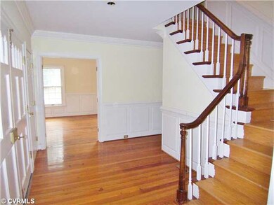 Foyer - Double coat closets, raised paneling, doub