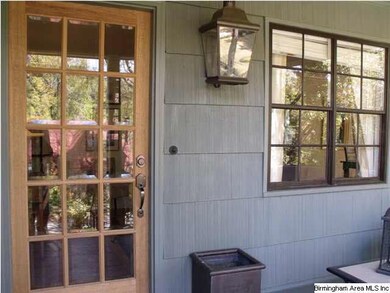 Fabulous front porch welcomes you home.