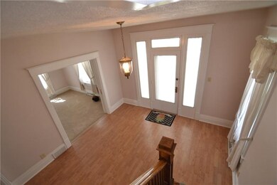 High ceilings create a welcoming entrance