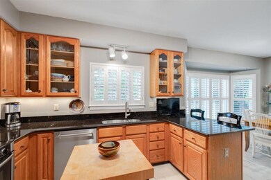 The thoughtfully designed Kitchen with granite cou