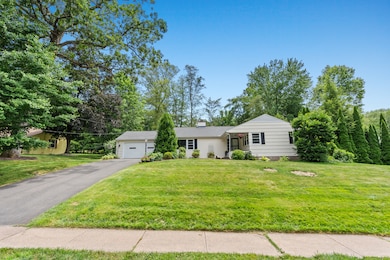 Lovely ranch home situated between the Asylum Avenue cul de sac that borders Westmoor Park and the Bugbee School sledding hill