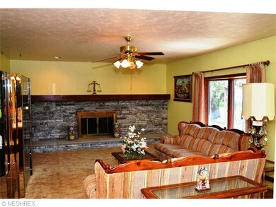 FAMILY ROOM WITH ANDERSEN BAY WINDOW-GAS FIREPLACE
