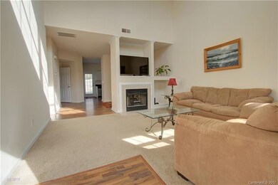 FOYER: The front door opens to an upgraded laminat