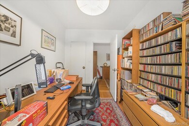 Office area featuring light wood-style flooring