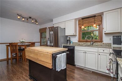 Beautiful kitchen remodel includes new cabinets, n