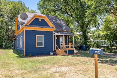Tucked into the trees, this home just calls you into it.