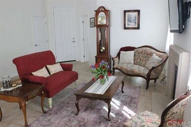 Bright living room has 10-foot ceilings.