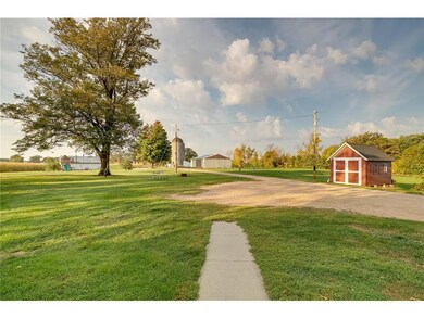 Land with outbuildings!