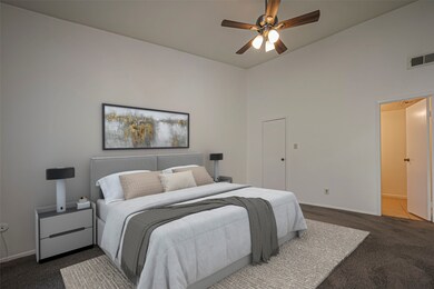 Virtually enhanced primary bedroom. It is very spa