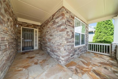 Property entrance with a porch