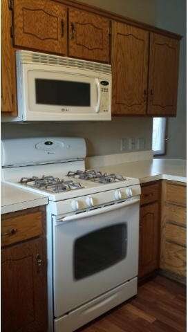 Newer stove and microwave.