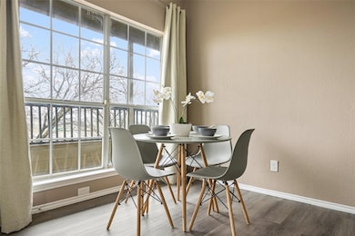 Dining space featuring hardwood / wood-style floor
