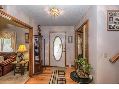 NICE ENTRY WAY WITH HARDWOOD FLOORS