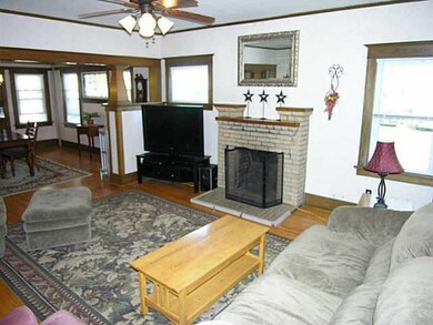 Living Room. Spacious living room with wood burnin