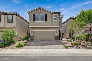Traditional-style home with stucco siding, an atta