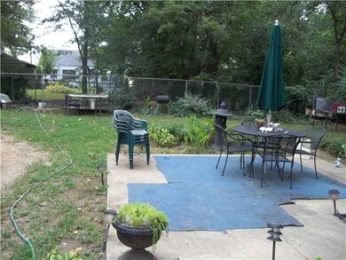 Backyard has dog run and large patio.