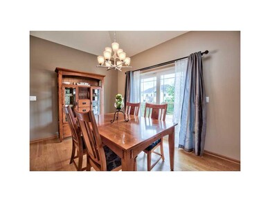 Dining Area. HARDWOOD FLOORING AND SLIDER TO DECK 