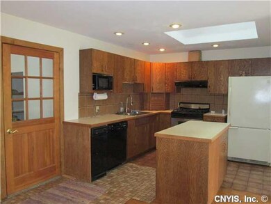 Kitchen. Door in kitchen leads to large mudroom/la