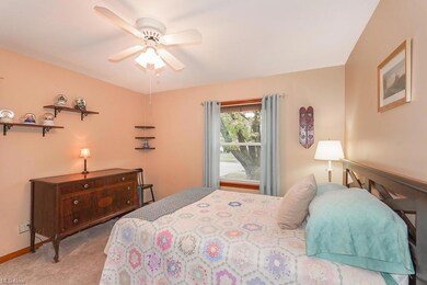 Bedroom with carpet and ceiling fan