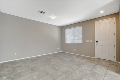 Spare room with light tile patterned flooring, bas