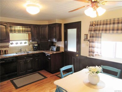 the spacious dine in kitchen is moderately updated