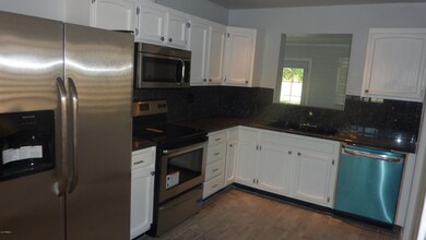 Modern kitchen open to bonus room
