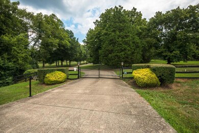 5.13 Acres fronts to Highway 96 West and backs to Old Charlotte Pike