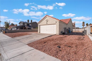 View of front of house with a garage, concrete dri