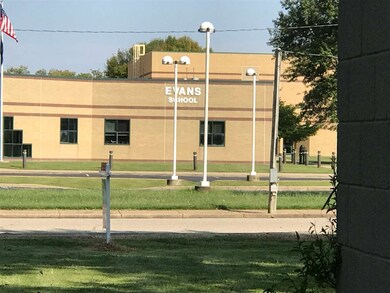 Across the street from Evans Elementary School