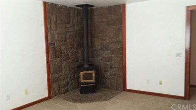 Wood burning stove in front bedroom