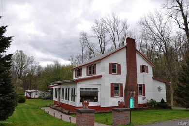 Spacious sun-porch of main home