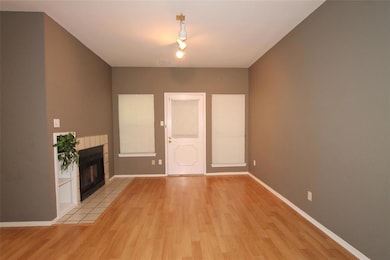 Unfurnished living room featuring light wood-styl