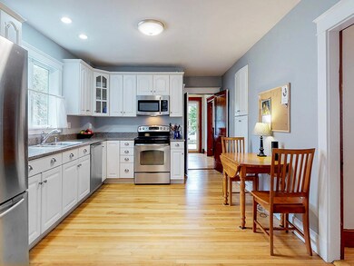 View from the kitchen to the front hall.