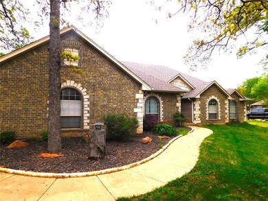 View of front of property with a front yard