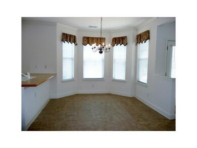 Dining Room. Bay window, ceramic tile flooring