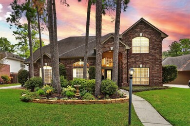 The home features 3.5 sides brick and the exterior was painted in 2021.  There is extensive, well maintained landscaping featuring stacked stone beds and a sprinkler system.