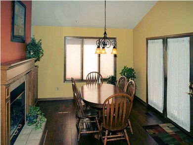Two Way Fireplace Into Informal Dining Area
