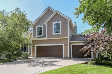 Stucco and three car garage
