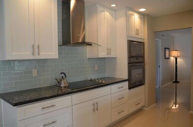 glass cooktop and stainless hood
