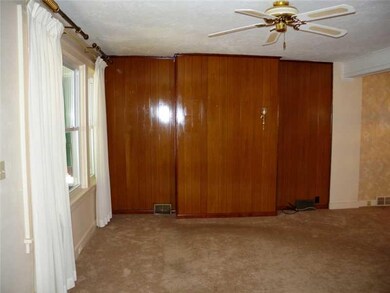 Living Room. One wall of the living room has prett