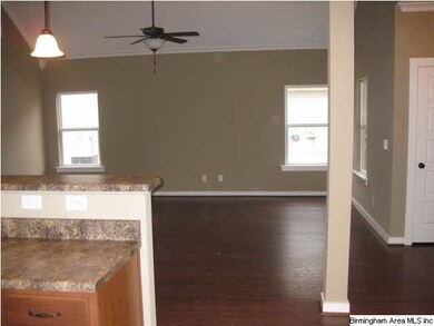 A view from the Kitchen into the Great room. Look 