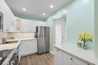 View of the Kitchen from the dinning area.