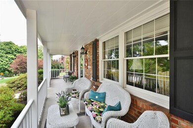 Sit and sip on your front porch and watch the worl