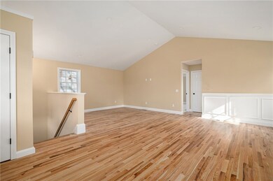 Enter into a spacious open concept living area. Th